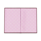 Pink gingham endpapers inside the burgundy covers