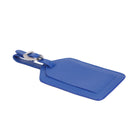 Cobalt luggage tag lying flat, the strap fastened through its silver buckle