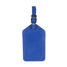 Cobalt blue leather luggage tag from the front, hanging from its buckled strap