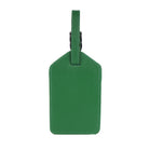 Back of the emerald luggage tag, plain leather with the strap looped through the top