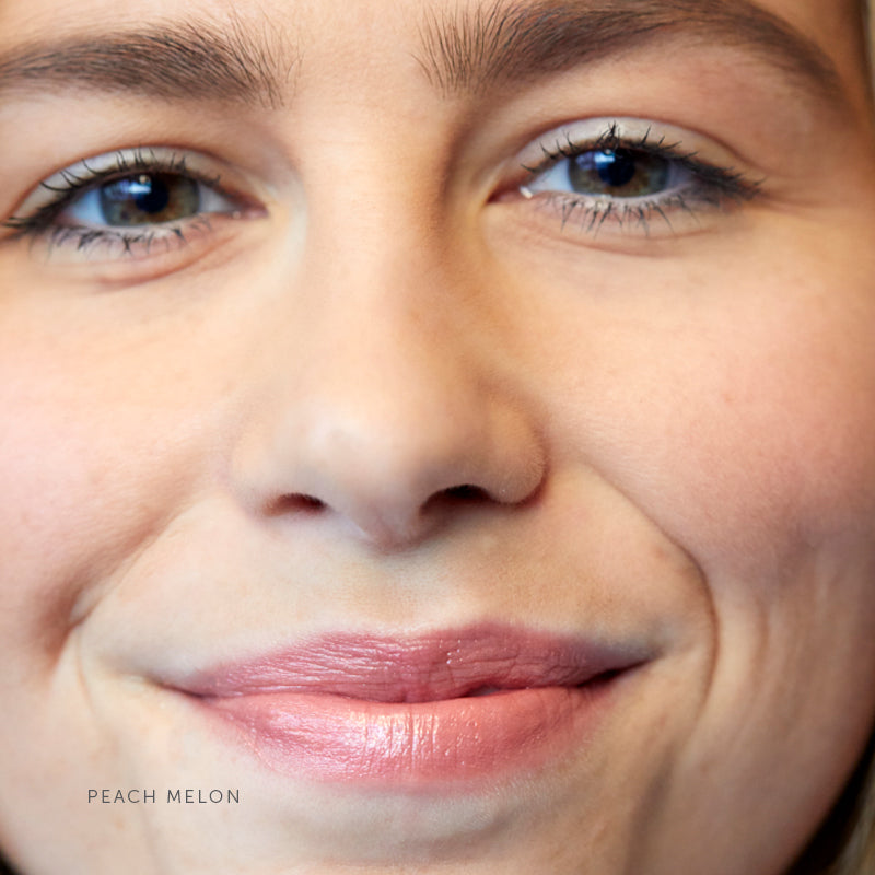 Lük Beautifood Lip Nourish natural lipstick in Peach Melon — worn on lips