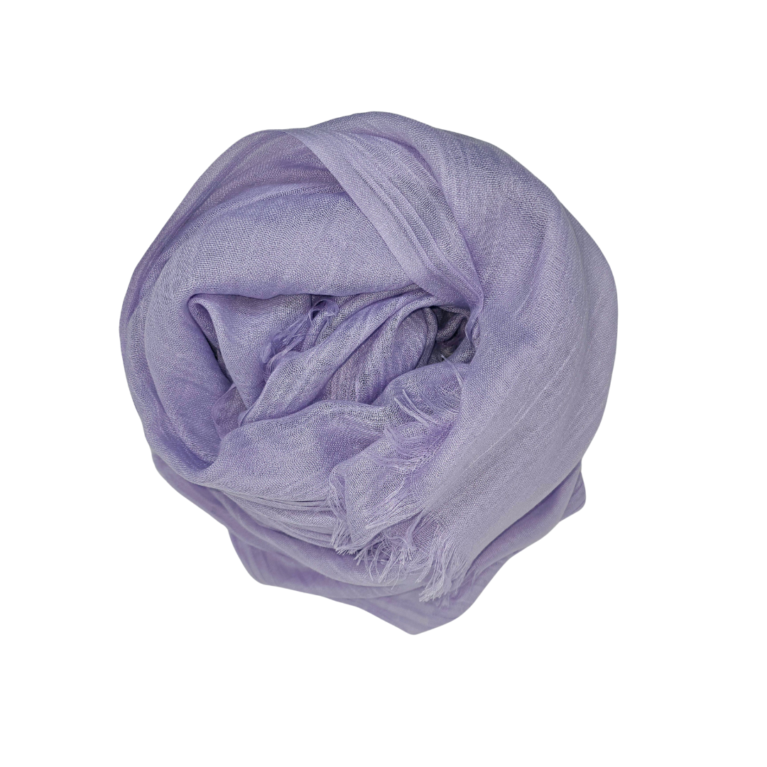 Beauty in Bamboo scarf in Lavender, a pale lilac, loosely coiled
