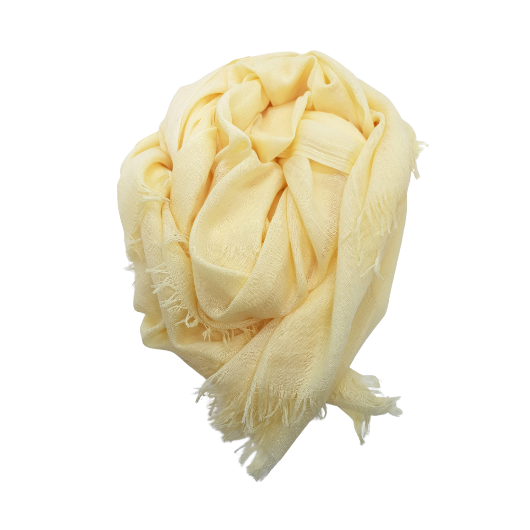 Beauty in Bamboo scarf in Lemon Meringue, a pale buttery yellow, loosely bundled