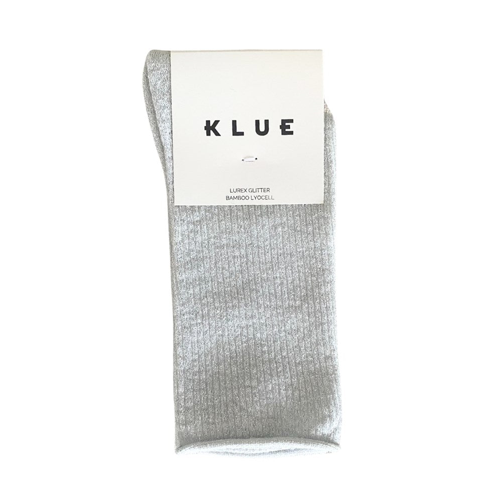 Silvery-white KLUE glitter lurex socks folded in their branded paper band