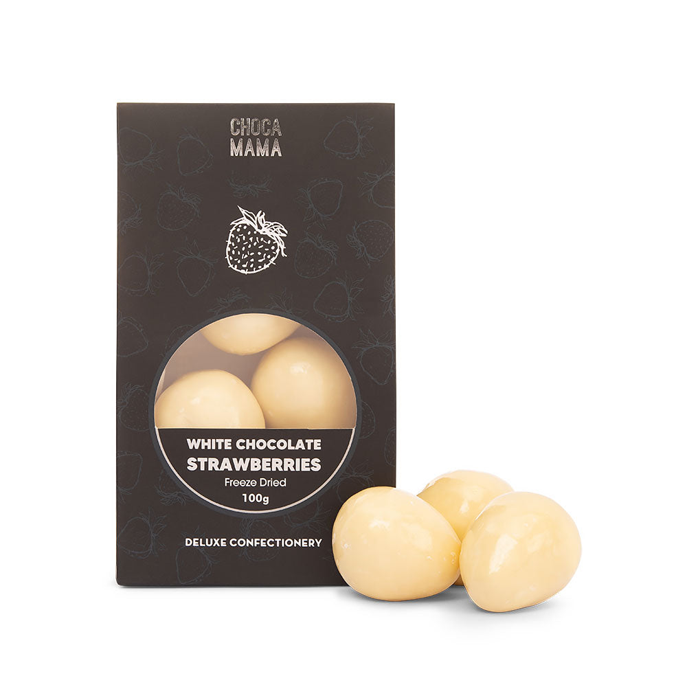 Chocamama white chocolate freeze-dried strawberries box with three chocolates beside it