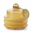 Yellow ribbed glass Beam candle with a domed lid and Meyer Lemon swing tag