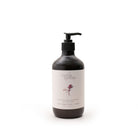 The 500ml Rose Geranium hand and body wash bottle, its label reading Rose Geranium, Grapefruit & Clary Sage.