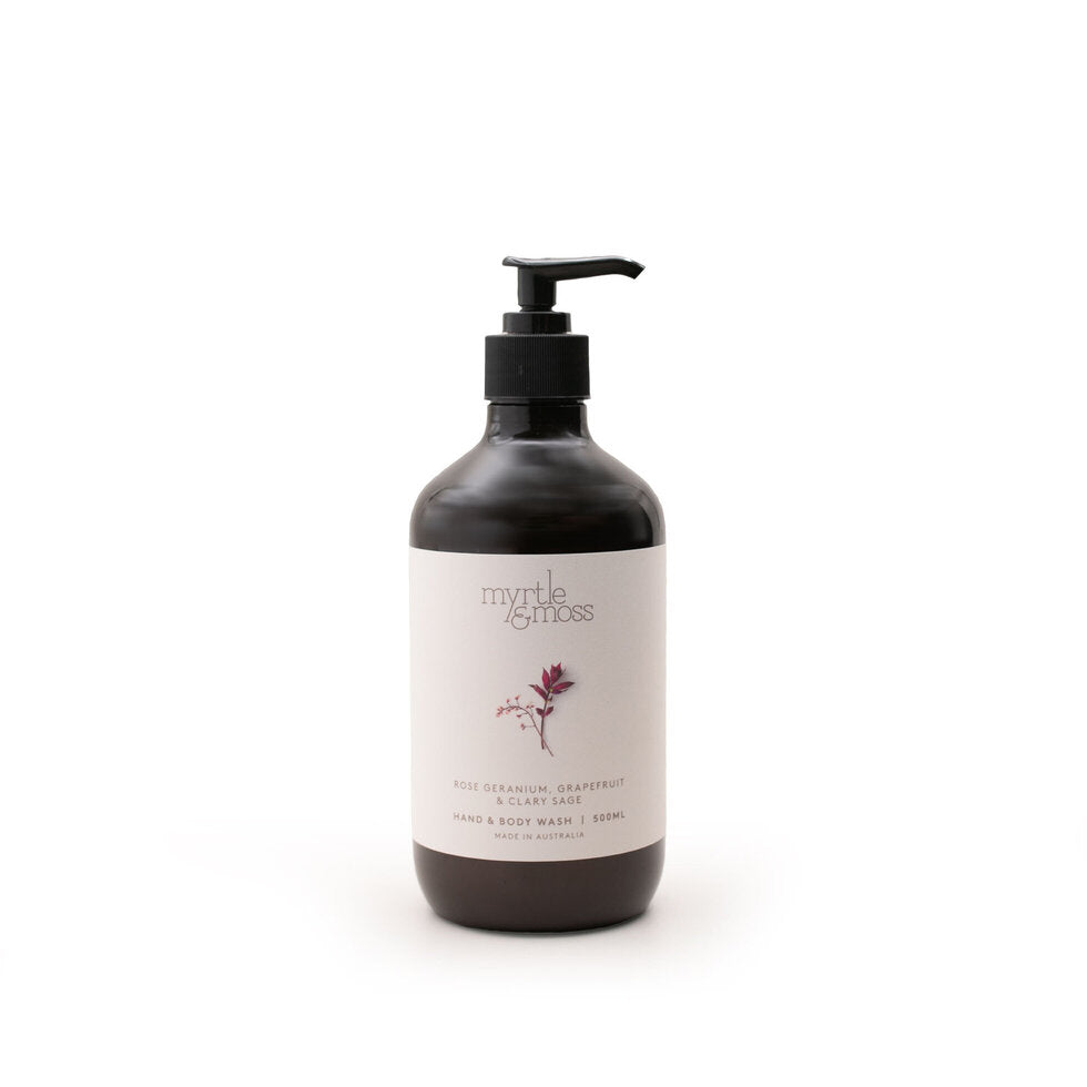 The 500ml Rose Geranium hand and body wash bottle, its label reading Rose Geranium, Grapefruit & Clary Sage.