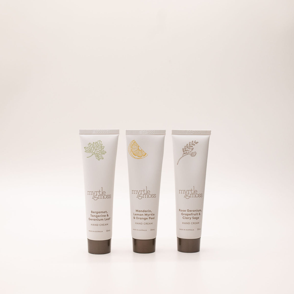 Three 30 mL Myrtle & Moss hand cream tubes: Bergamot, Tangerine & Geranium Leaf; Mandarin, Lemon Myrtle & Orange Peel; Rose Geranium, Grapefruit & Clary Sage.