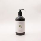 Myrtle & Moss Bergamot hand and body wash in a 500ml amber glass bottle with a black pump and a pale label showing a green geranium-leaf sprig.