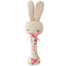 Bunny stick rattle with linen head and pink floral handle tied with a pink bow