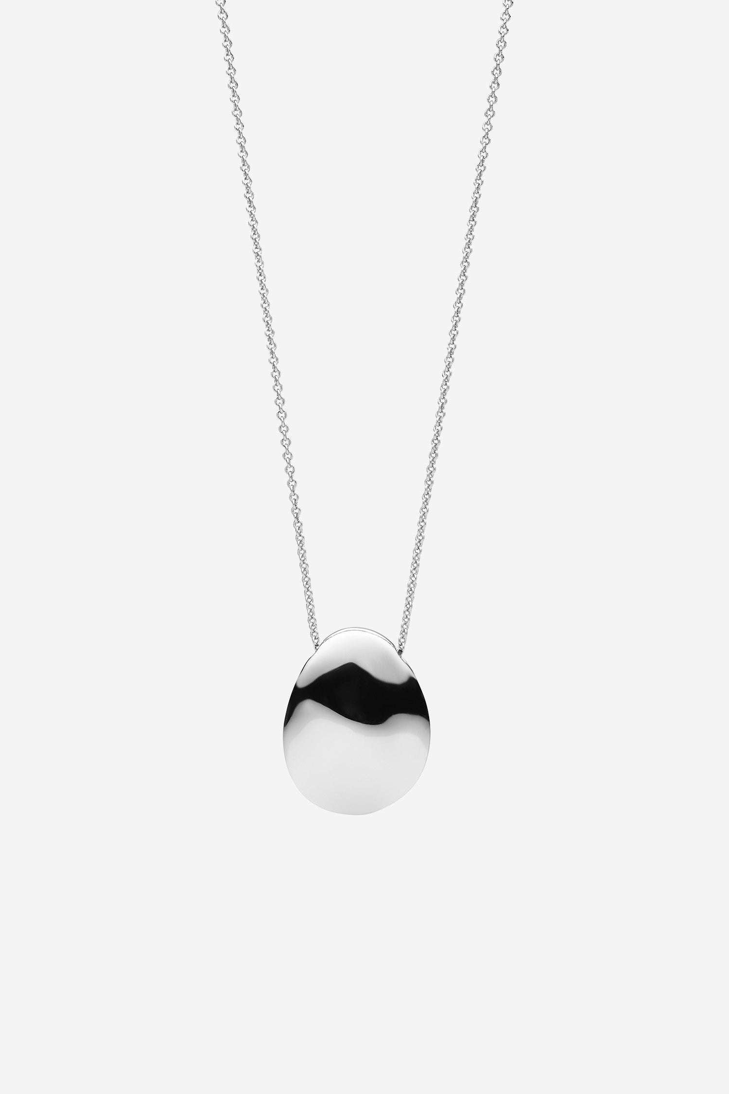 Silver pendant necklace with a polished, irregular organic-shaped pendant on a fine chain.