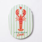Oval mango wood wall plaque with mint and white stripes, a red lobster with a small red heart above, and a little pinch of love lettered in green and red script beneath