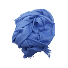 Beauty in Bamboo scarf in Periwinkle, a mid cornflower blue, gathered into a coil