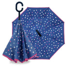 Reverse umbrella in Polka Dots design, navy canopy with white and pink spots and pink trim