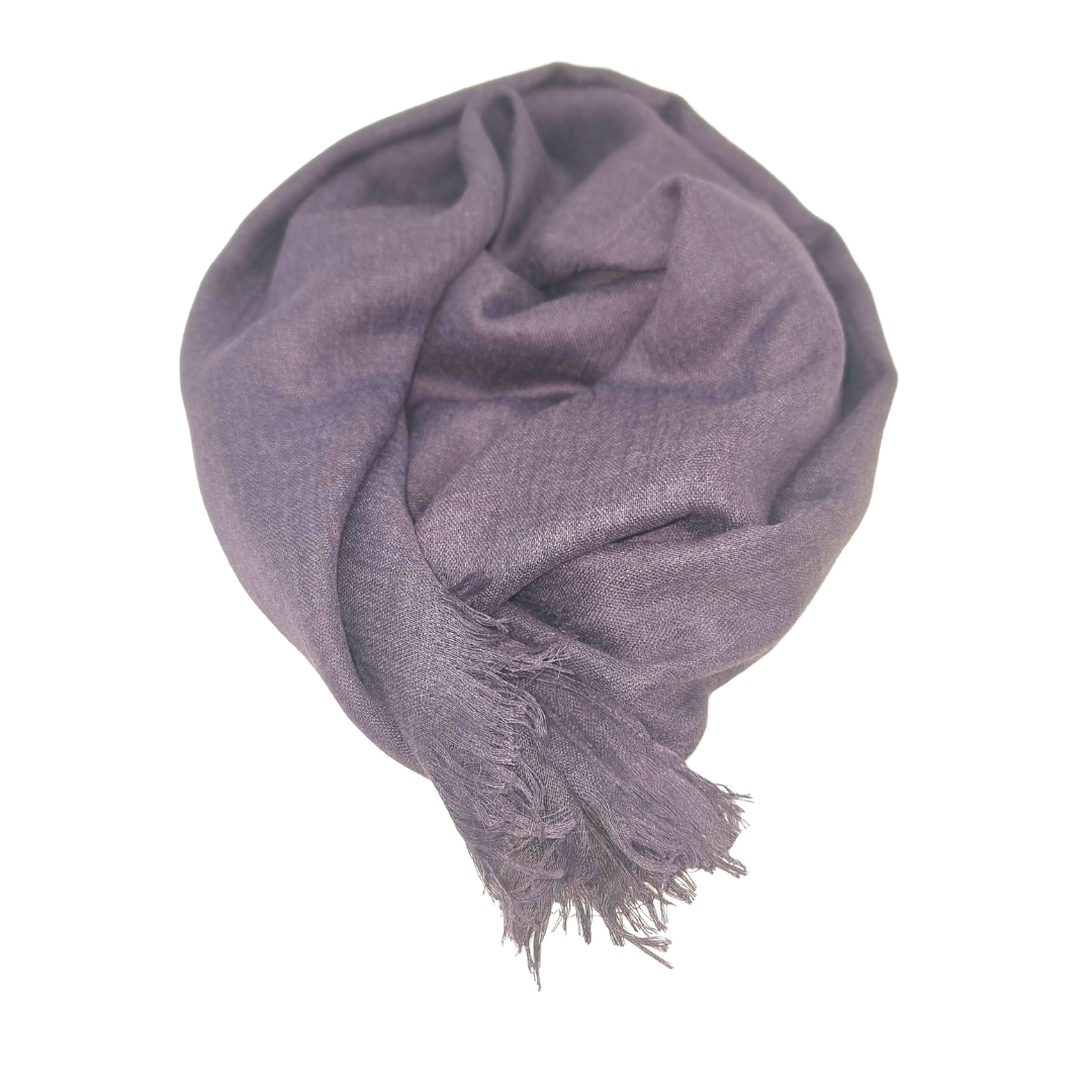 Beauty in Bamboo scarf in a smoky grey-lilac, draped with its fringed hem forward
