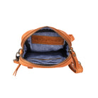 The tan bag unzipped from above, showing the blue fabric lining, card slots and a stamped leather tab