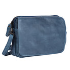 Midnight blue cross body bag angled, showing the flap and side