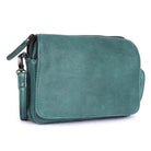 Green cross body bag angled, showing the flap and side