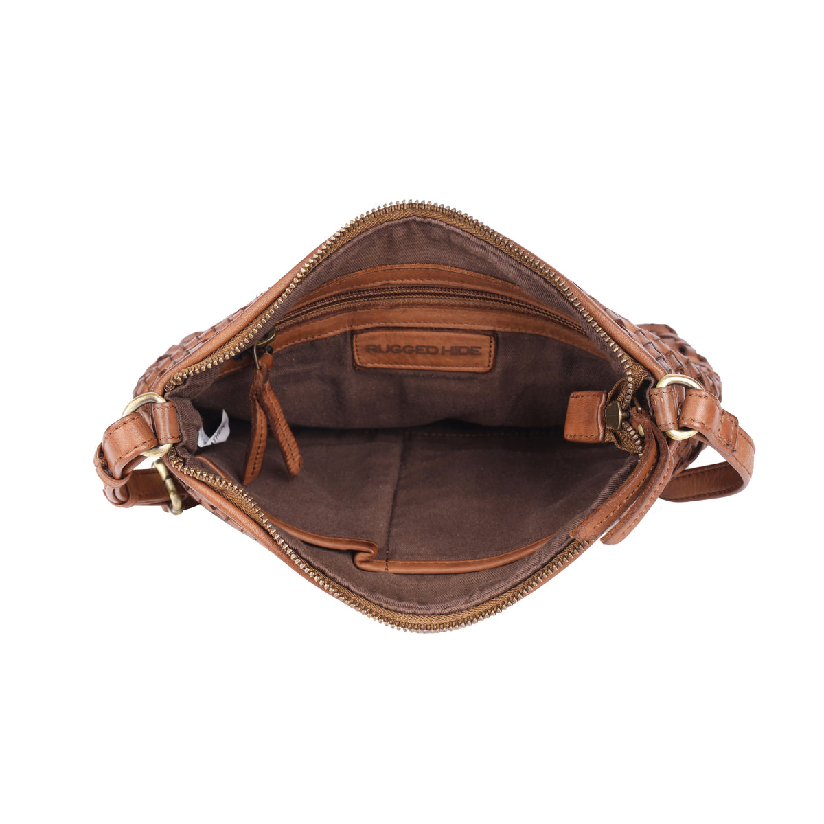 The oak bag unzipped from above, showing the brown fabric lining, inner pockets and a stamped leather tab