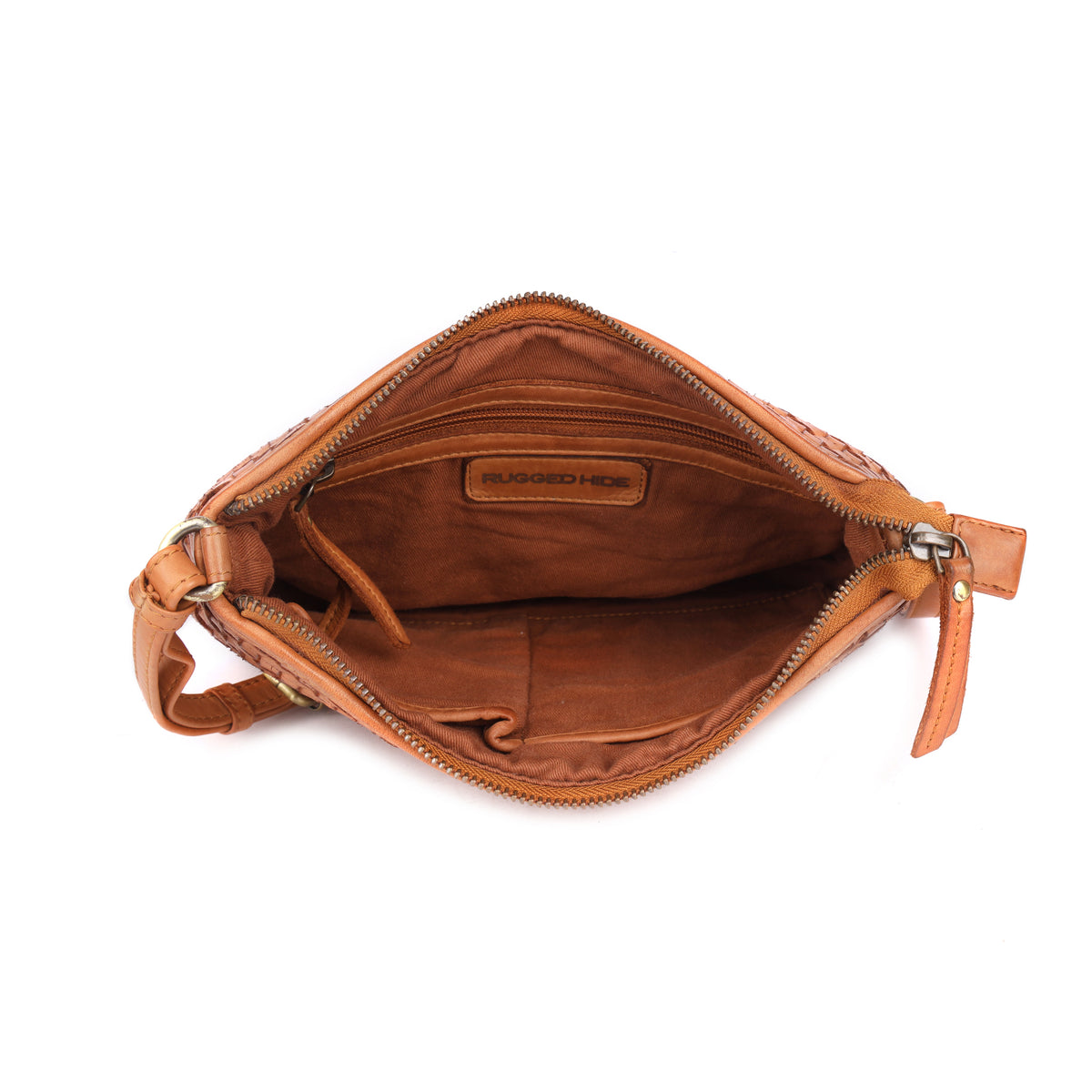 The tan bag unzipped from above, showing the lining and inner pockets