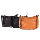 Small leather bags lined up in dark brown, black and tan