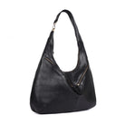 Black shoulder bag angled to the side, showing the depth of the body