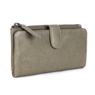 Olive slim wallet angled, showing the zip along the top and the press-stud tab
