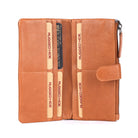 Tan wallet open flat, showing rows of card slots
