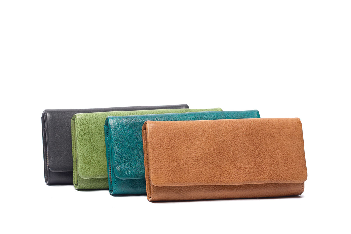 Long leather wallets fanned out in black, apple green, pine green and tan