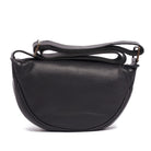 Black leather half-moon cross body bag, the strap gathered above it