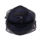 The black bag open, showing the dark navy lining and a stamped leather tab