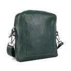 Green sling bag angled, showing the side seam and strap clip