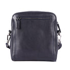 Back of the navy sling bag, showing the zip pocket