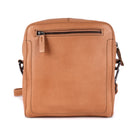 Back of the nude sling bag, showing the zip pocket