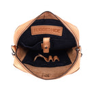 The nude bag open, showing the dark navy lining, the tablet sleeve tab and a stamped leather tab