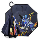Reverse umbrella with Dani Till red-tailed black cockatoo and butterflies artwork under a navy canopy