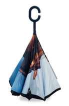 Bay Mare reverse umbrella folded inward and standing on its points, the horse print on the outside