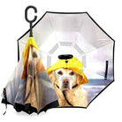 Reverse umbrella in Rain Dog design showing a labrador in a yellow rain hat printed inside