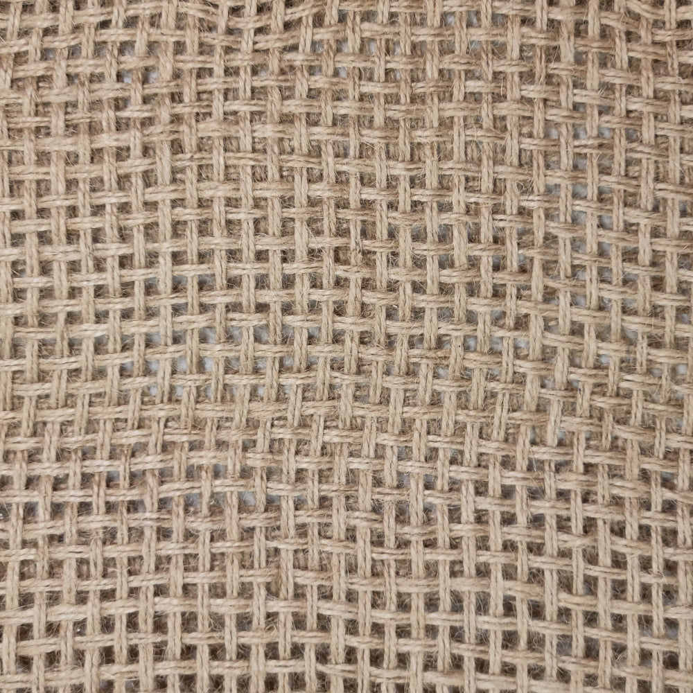 Close-up of the Rowan placemat's natural jute open weave