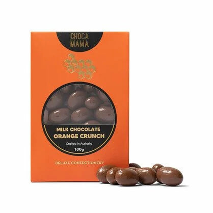 Orange Chocamama box of milk chocolate orange crunch with a round window, loose chocolate pieces in front