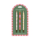 Three printed ballpoint pens, tulip, pink and orange stripe and lemon, clipped to an arched green card with a striped border