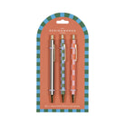 Three printed ballpoint pens, black pinstripe, blue and green check and pink and orange check, clipped to an arched orange card