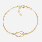 Gold double-strand bracelet, the two chains crossing over each other at the centre