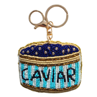 Hand-beaded keyring shaped like an open caviar tin, navy beads with CAVIAR in pale blue, on a gold-tone ring and clip.