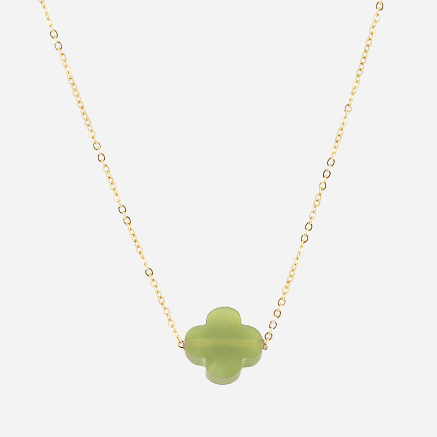 Fine gold chain necklace with a pale green glass four-leaf clover pendant