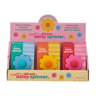 Counter display box of boxed silicone daisy spinners in green, yellow and red packs