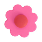 Pink daisy spinner with a coral centre