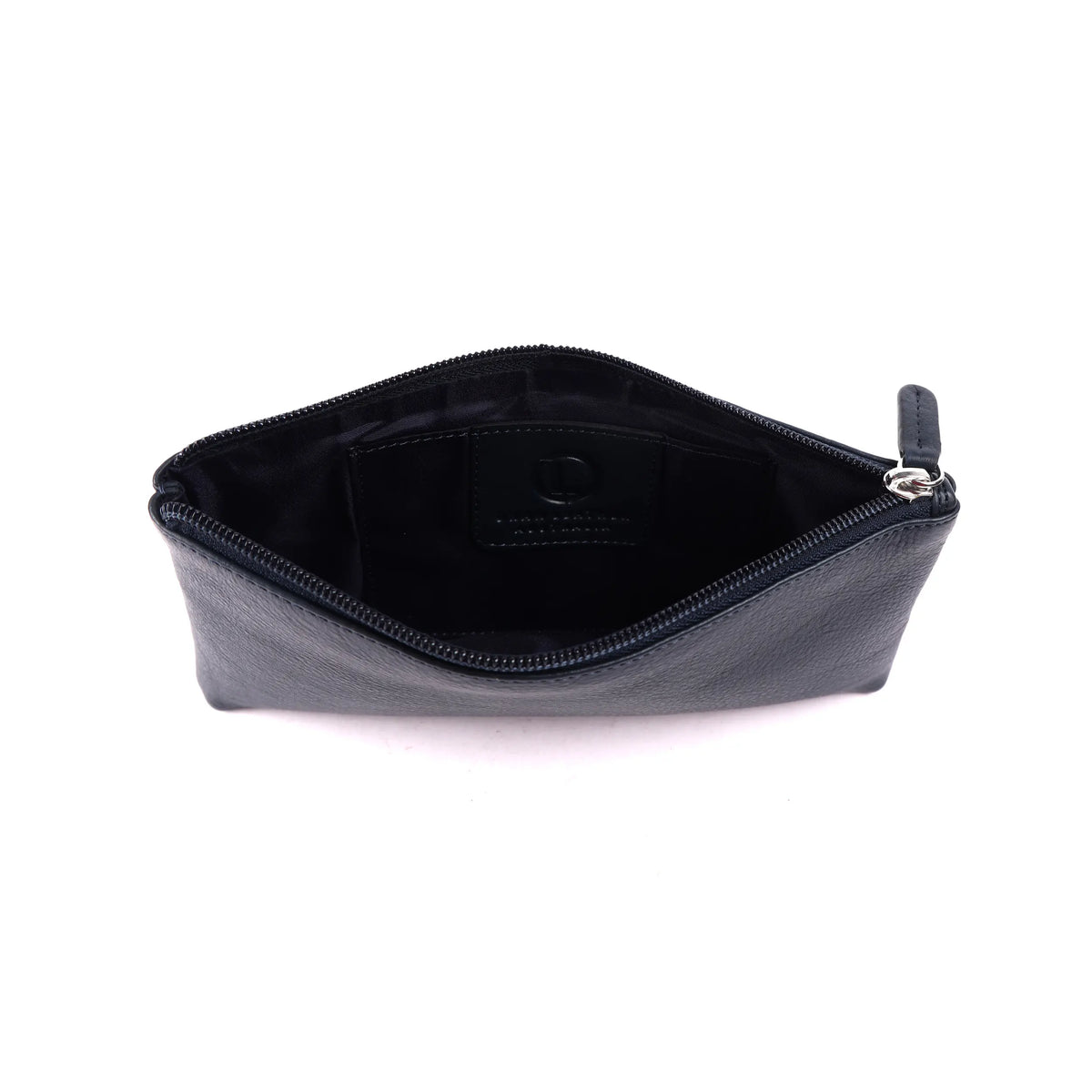 Navy makeup case unzipped, showing the dark lining and an inner slip pocket