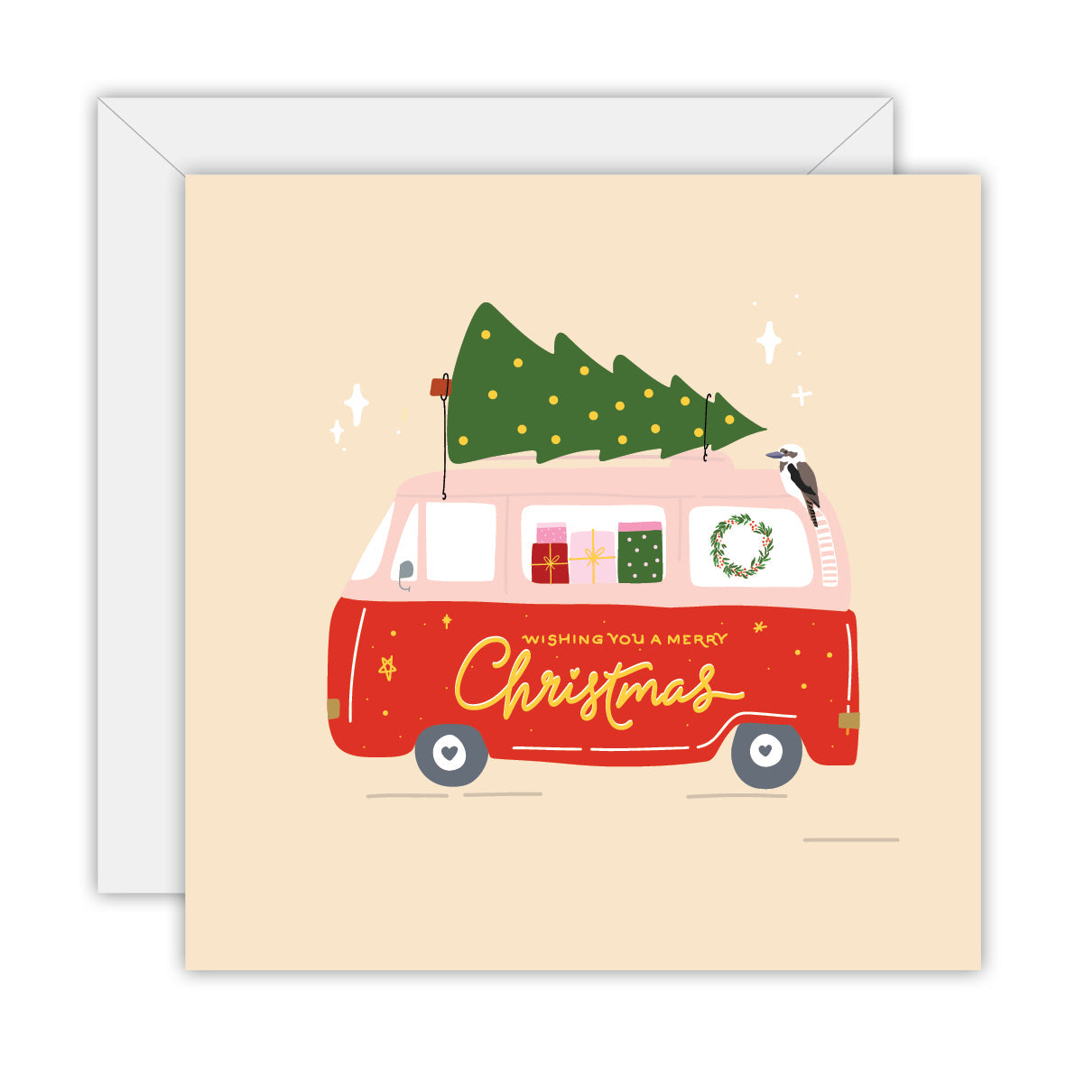Square cream card with a red kombi van carrying a Christmas tree and a kookaburra, lettered Wishing you a merry Christmas, on a white envelope